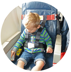 Little boy in CARES Child Harness